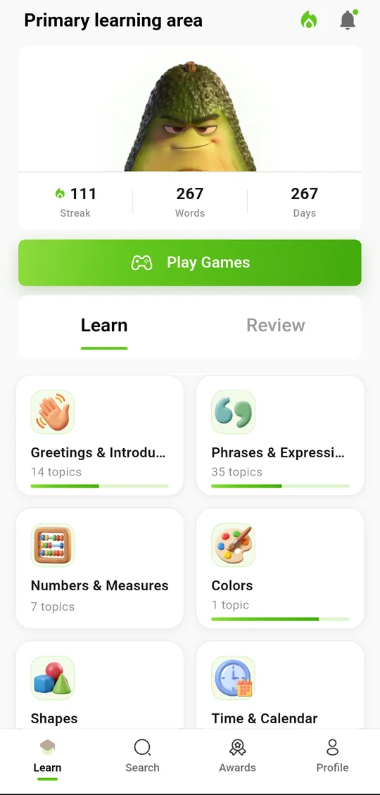 The ezSpanglish Learn screen: Marco, your streak and word count, Play Games, and lesson topics.